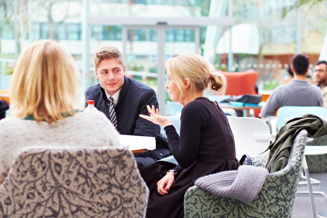 An image of staff meeting in the Atrium