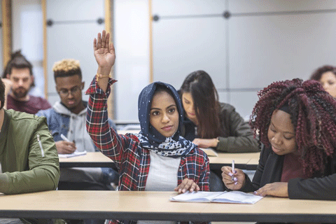 a group of  students in a classroom