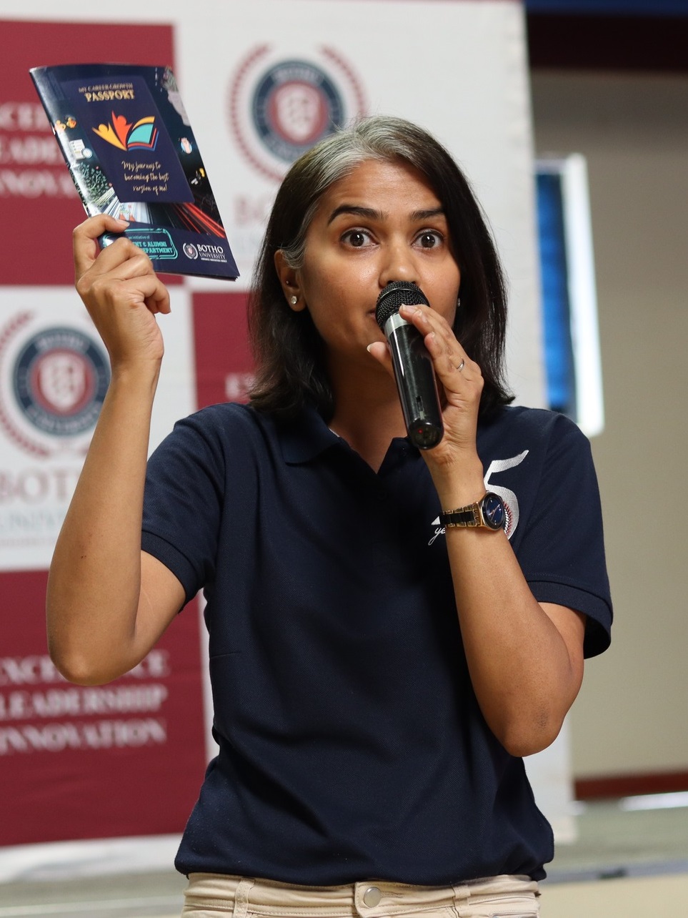 Aravinda Ram, an MBA Distance Learning alumna, presenting to an audience