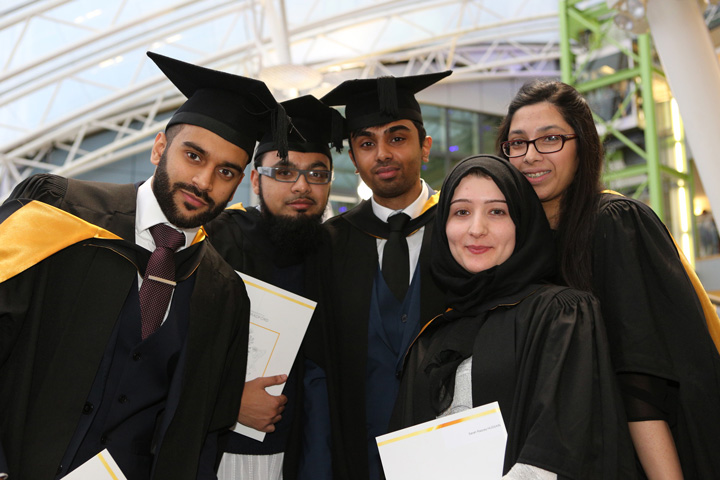 A group of students on their graduation taking a picture 