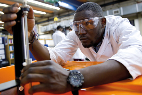 A civil engineering student wearing safety goggles in one of our teaching laboratories