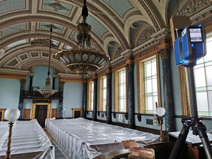 photo of a terrestrial laser scanner being used to scan the inside of a listed building at the world heritage site of Saltaire