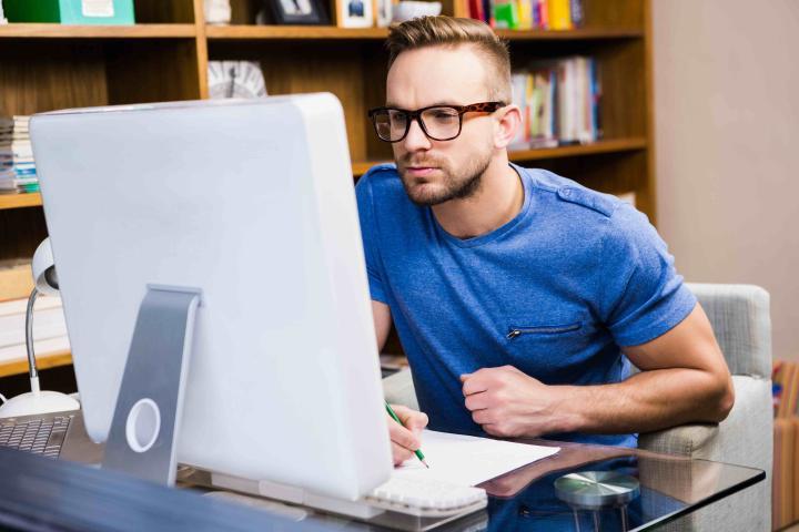 A student using their desktop computer’