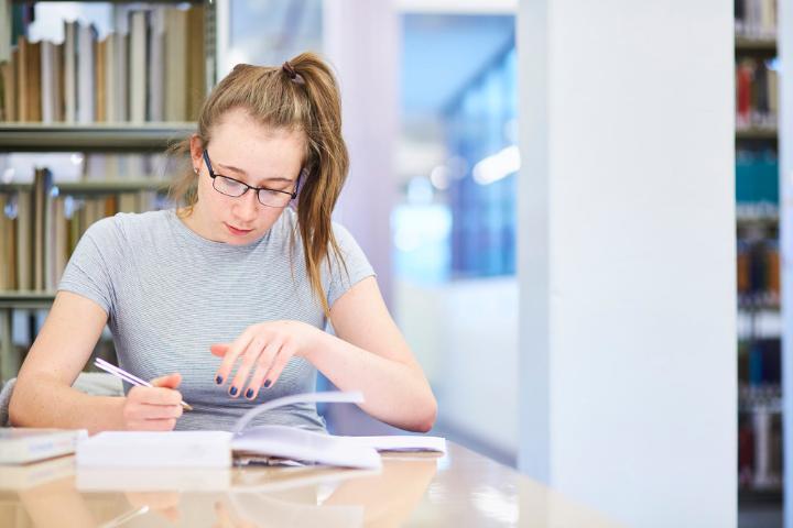 Student in library