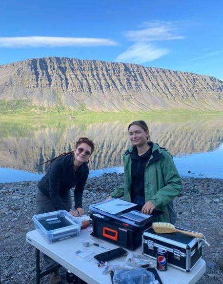 Students at an archaeological dig site in Iceland