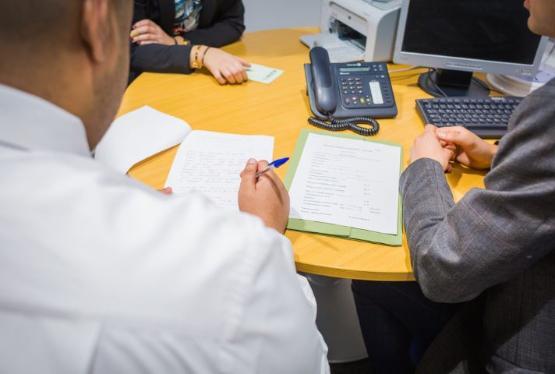 Members of the University of Bradford's Law Clinic discuss a case