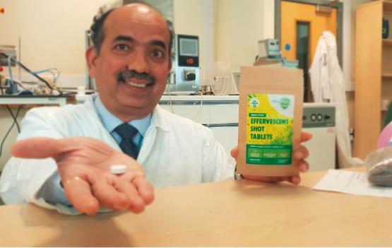 Prof Anant Paradkar holding an Effershield tablet