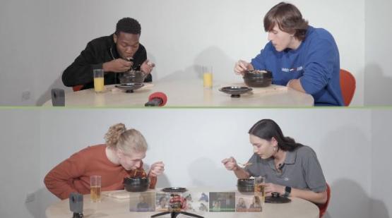 People eating Korean rice dish bibimbap