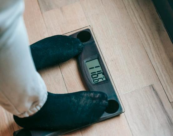 Person standing on weighing scales