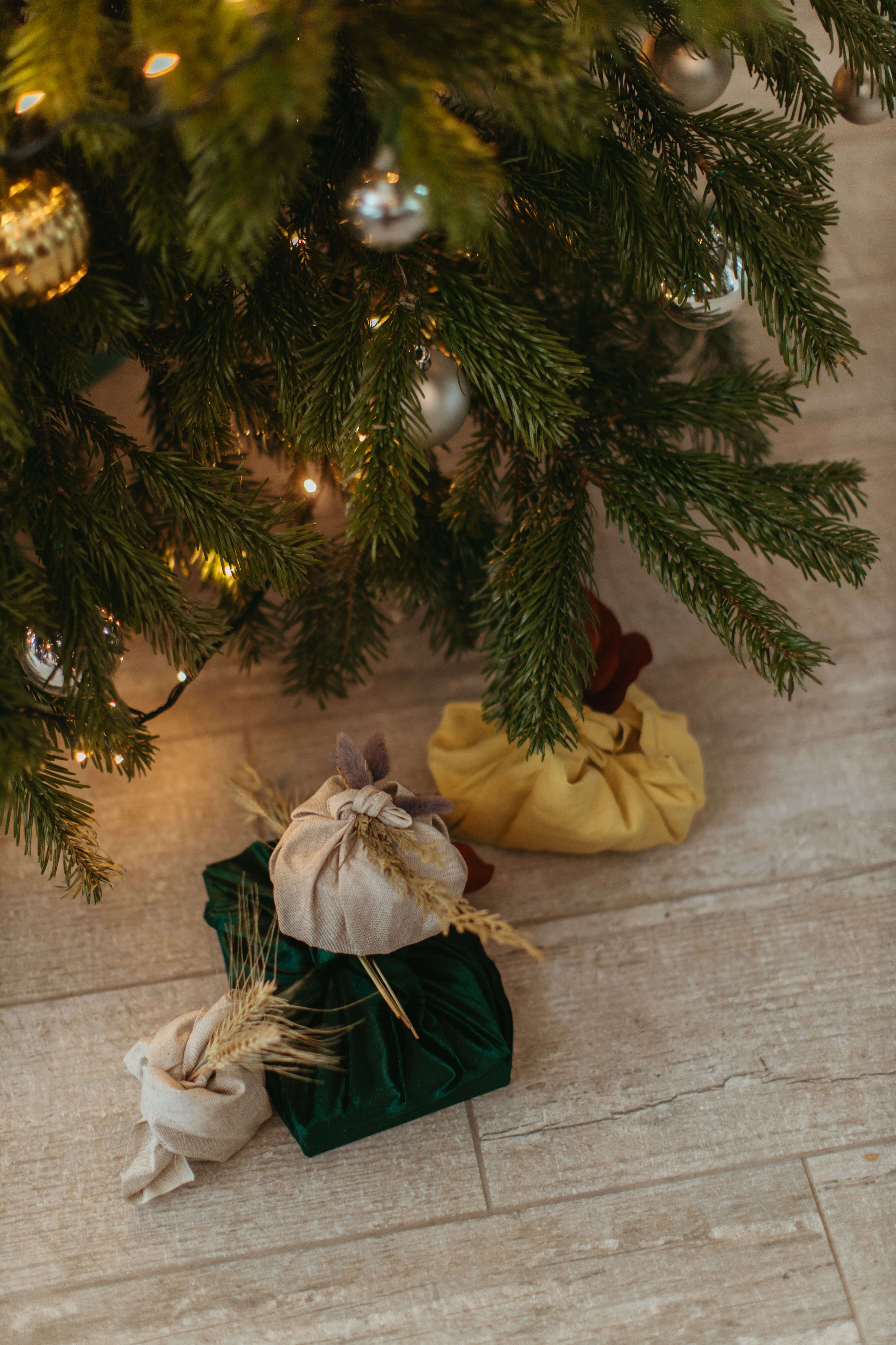 presents in fabric under a tree