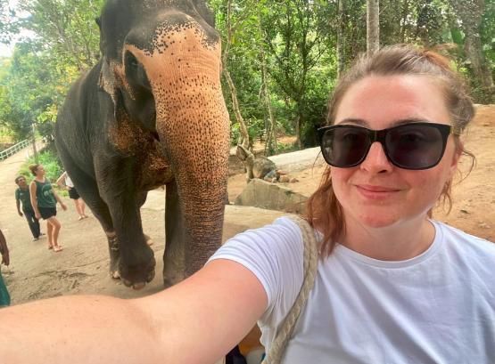 Student next to Elephant