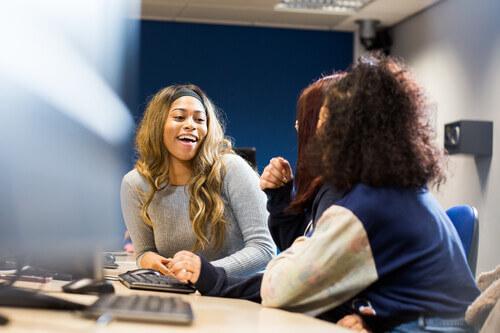 Generic image of three students talking