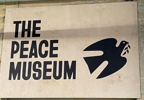 A sign welcoming visitors to the Peace Museum