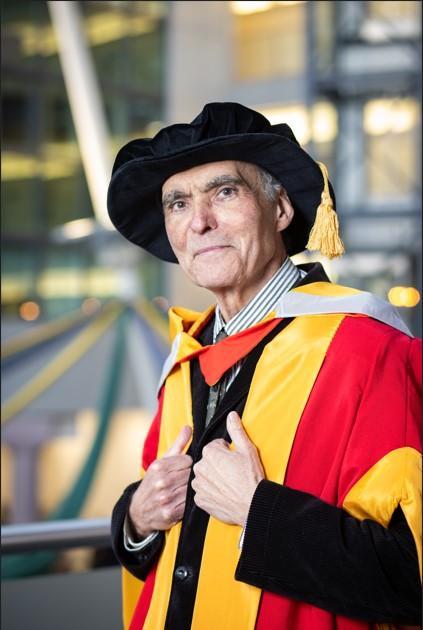 David Wilkinson University of Bradford Honorary Graduate in graduation gown and hat