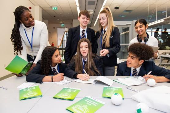 group of students sat at a table