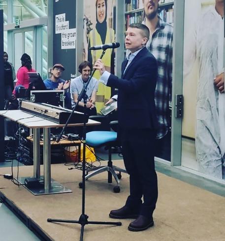 Dr Jack Lopez speaking at the 2022 Trans Day of Rembrance Ceremony in Richmond Atrium