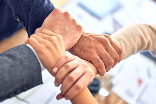 Photo showing hands clasping each other 