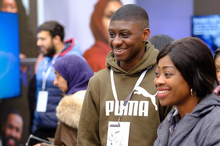 A landscape shot of two students at our October Open Day