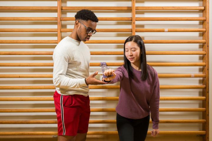 Two physiotherapy students in the Movement Lab