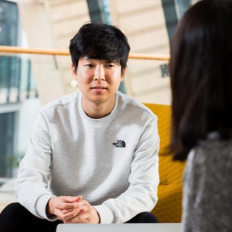 Two students chatting.