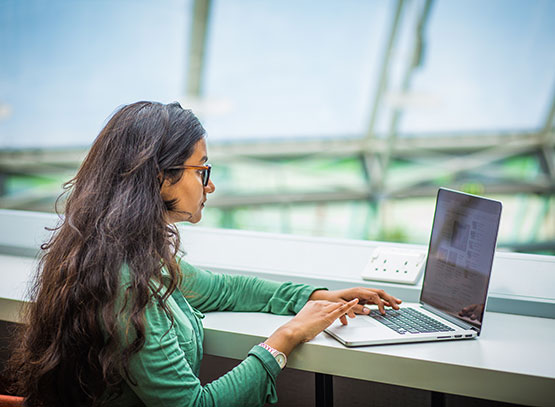 A student using their laptop.